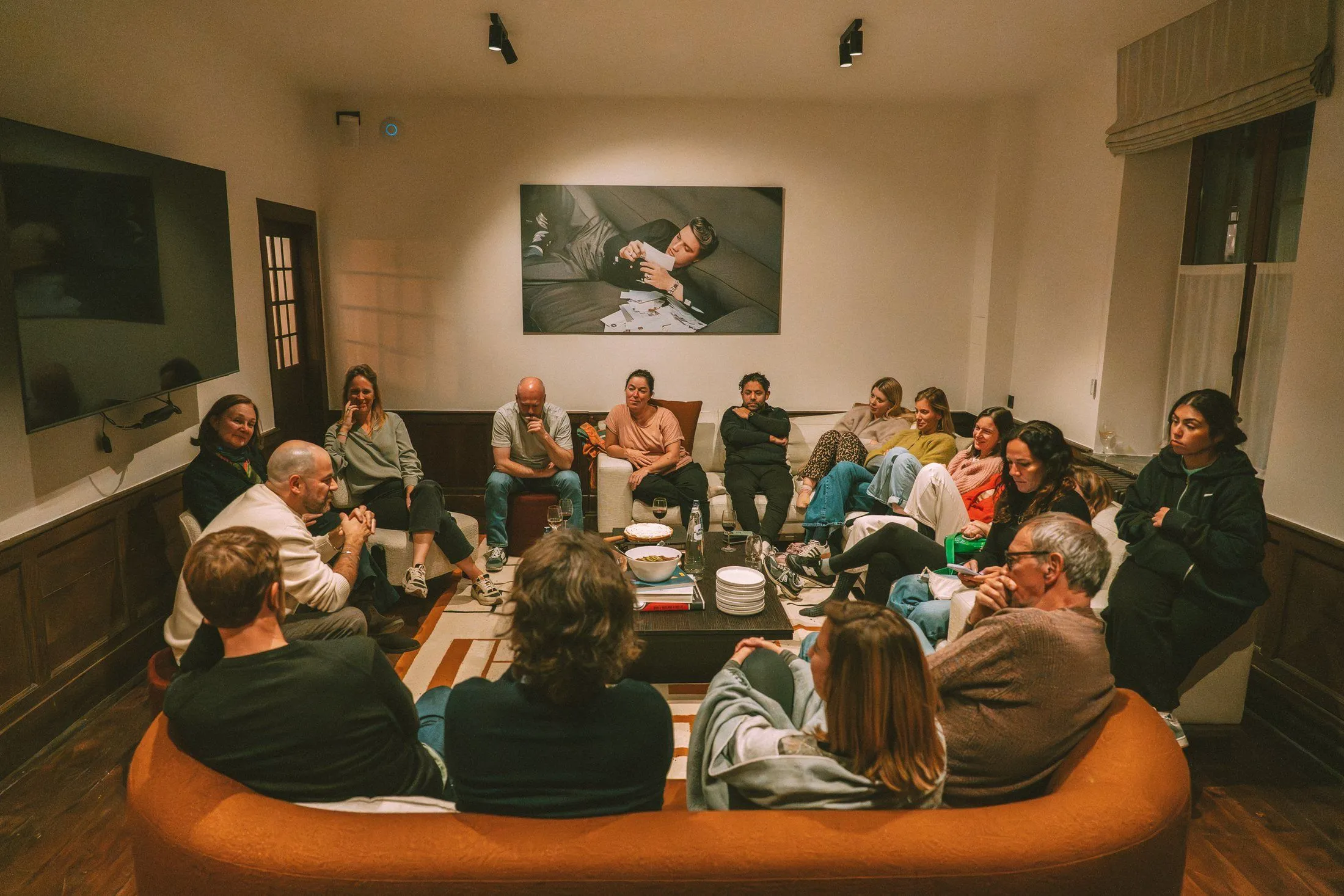 The whole cohort sitting in a circle during a collective session